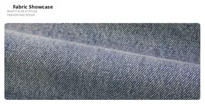 Macro shot of blue denim fabric showing detailed twill texture and indigo fiber weave