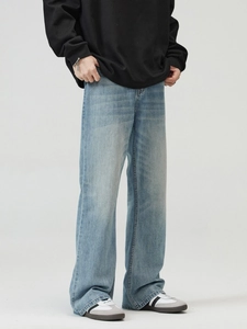 Men's retro light blue flared jeans with vintage wash and whiskers on denim fabric
