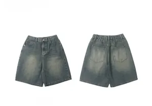 Front and back view of vintage wash blue denim shorts with comfortable elastic waistband