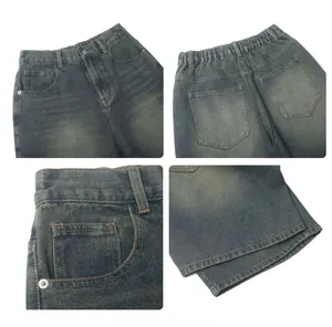 Detail view of vintage washed blue denim shorts with elastic waist and classic pockets