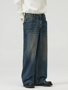 Vintage washed deep blue wide-leg jeans with retro distressed whiskers and straight-cut fit
