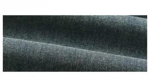Détail macro d'un tissu denim lourd de qualité supérieure avec armure sergé bleu foncé