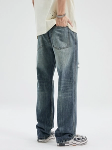 Men's American retro washed blue flare jeans with distressed crack design and ripped details