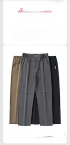 Close-up of three wide-leg lyocell casual trousers in khaki, dark grey, and black colors