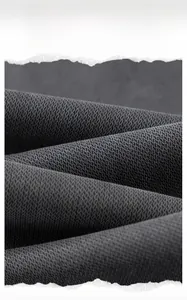 Macro shot of dark grey Lyocell fabric with twill texture and soft drape detail