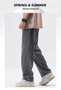 Side view of gray men's loose straight-leg casual pants with reinforced stitching details