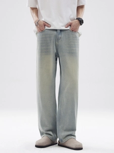 Men's retro light blue washed loose wide-leg jeans with a vintage distressed finish