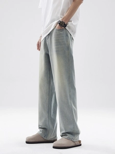 Men's light blue vintage washed wide leg denim jeans in a cleanfit straight cut style