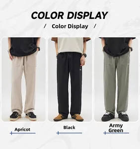 Detailed view of elastic drawstring waist and large pockets on summer linen pants