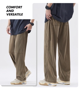Detail of loose fit straight leg lounge pants featuring tactical knee stitching and pockets