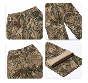 Detail of camouflage cargo pants showing stitching, side pockets, and warm fleece lining