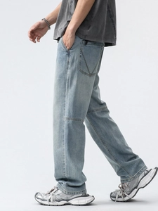 Jean large en Lyocell bleu clair pour homme avec délavage vintage et coutures latérales