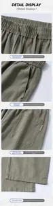 Detailed close-up showing the linen fabric texture and drawstring waist of casual pants