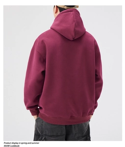 Rear view of maroon oversized heavyweight hoodie with dropped shoulders and ribbed cuffs