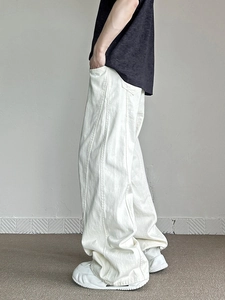 Pantaloni uomo in denim color panna stile high-street con gamba larga e dritta