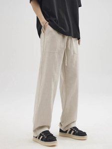 Men's loose fit linen drawstring casual pants in beige with a straight wide leg cut