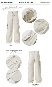 Detail view of beige multi-pocket cargo pants showing wide-leg cut and metal hardware