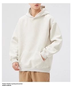 Detail of oatmeal oversized hoodie with kangaroo pocket and ribbed cuffs for men