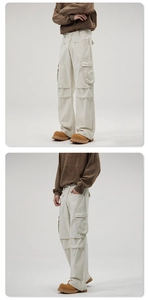 Detail view of off-white multi-pocket cargo pants in vintage American retro street style