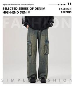 Detailed close-up of retro washed cargo jeans with side pockets and distressed denim finish