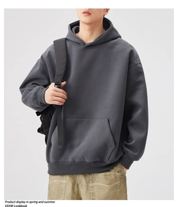 Deep grey heavyweight cotton hoodie with spacious front pocket and loose drop shoulder fit
