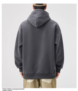 Back view of a heavy dark grey oversized drop-shoulder hoodie with ribbed cuffs and hem