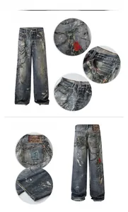 Close-up of vintage wash wide-leg jeans with metal chain print and red bear graphic