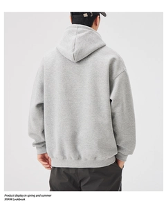 Rear view of heavy cotton heather grey hoodie with drop shoulder and ribbed hem detail