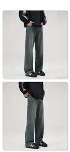 Detail view showing front and side fit of vintage blue flare jeans for men