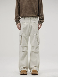 Retro cream multi-pocket cargo pants with straight wide-leg fit and patchwork detail