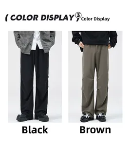 Detail showing the drape of wide-leg trousers in black and brown color options