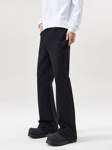 Men's slim fit flared denim pants in matte black finish for a stylish high street look