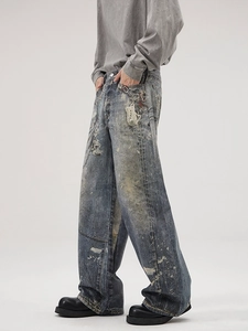 Jeans vintage a gamba larga lavaggio pesante con schizzi di vernice ed effetti usurati