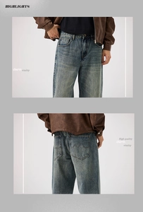 Détail du jean denim bleu délavé vintage montrant les poches arrière avec coutures ondulées