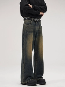Retro mud wash wide leg denim jeans in a loose straight fit for a vintage street style look