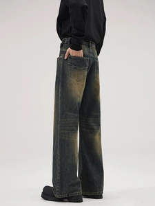 Men's vintage wash wide leg denim jeans with high waist and brown distressed finish