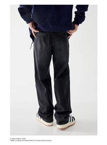Back view of loose straight washed denim pants with lightning texture and double pockets