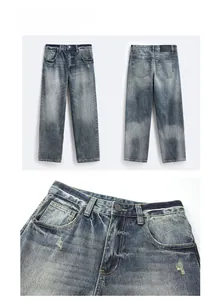 Dettaglio di jeans in denim lavato blu vintage con texture consumata e bottone in metallo