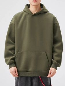 Men's olive green oversized hoodie with kangaroo pocket and ribbed cuffs in casual style