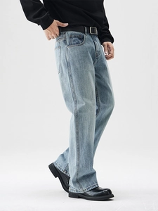Men's retro light blue washed denim jeans in a straight fit silhouette with black belt