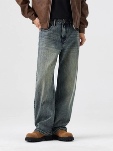 Jean large vintage délavé pour homme en bleu-jaune rétro avec une coupe droite et décontractée