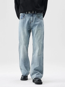 Men's retro light blue washed flared jeans with denim texture and black belt
