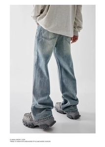 Full back view of men's vintage washed light blue wide-leg jeans with retro textures