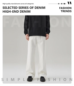 Stylishly paired white flared denim jeans for men with a modern minimalist aesthetic