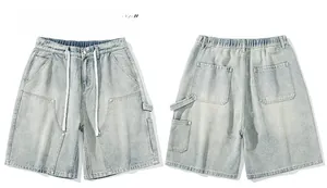 Detail view of light blue denim cargo shorts with elastic waist and drawstring