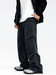 Men's street-style black wide-leg cargo jeans with oversized side pockets and relaxed fit