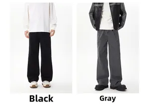Detail view of American street style multi-pocket cargo pants in black and grey wash