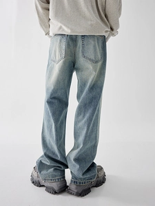 Men's retro wash light blue wide leg denim pants with distressed finish back view