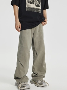 Men's sage green wide-leg cargo pants with metallic studs and a loose streetwear fit
