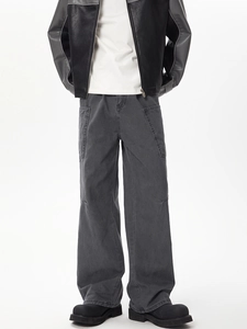 Detail view of American style dark grey multi-pocket cargo pants in a cleanfit washed look